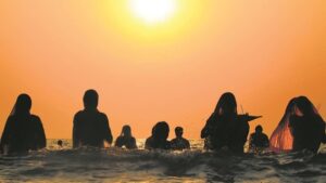 Chhath Puja rituals on the banks of the Yamuna River