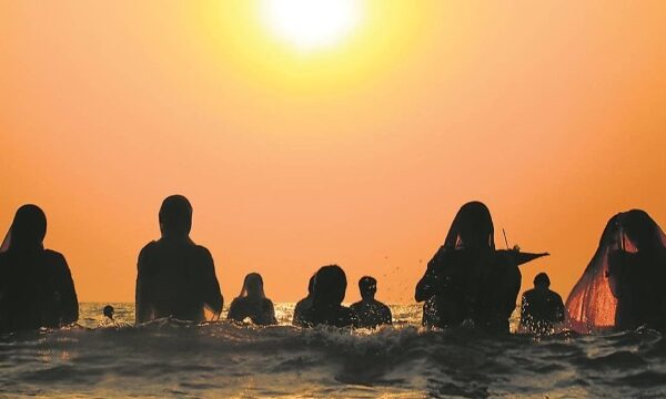 Chhath Puja rituals on the banks of the Yamuna River